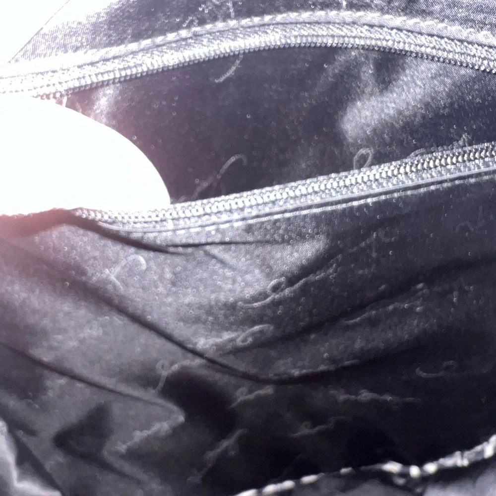 Vera Bradley black and white concerto backpack